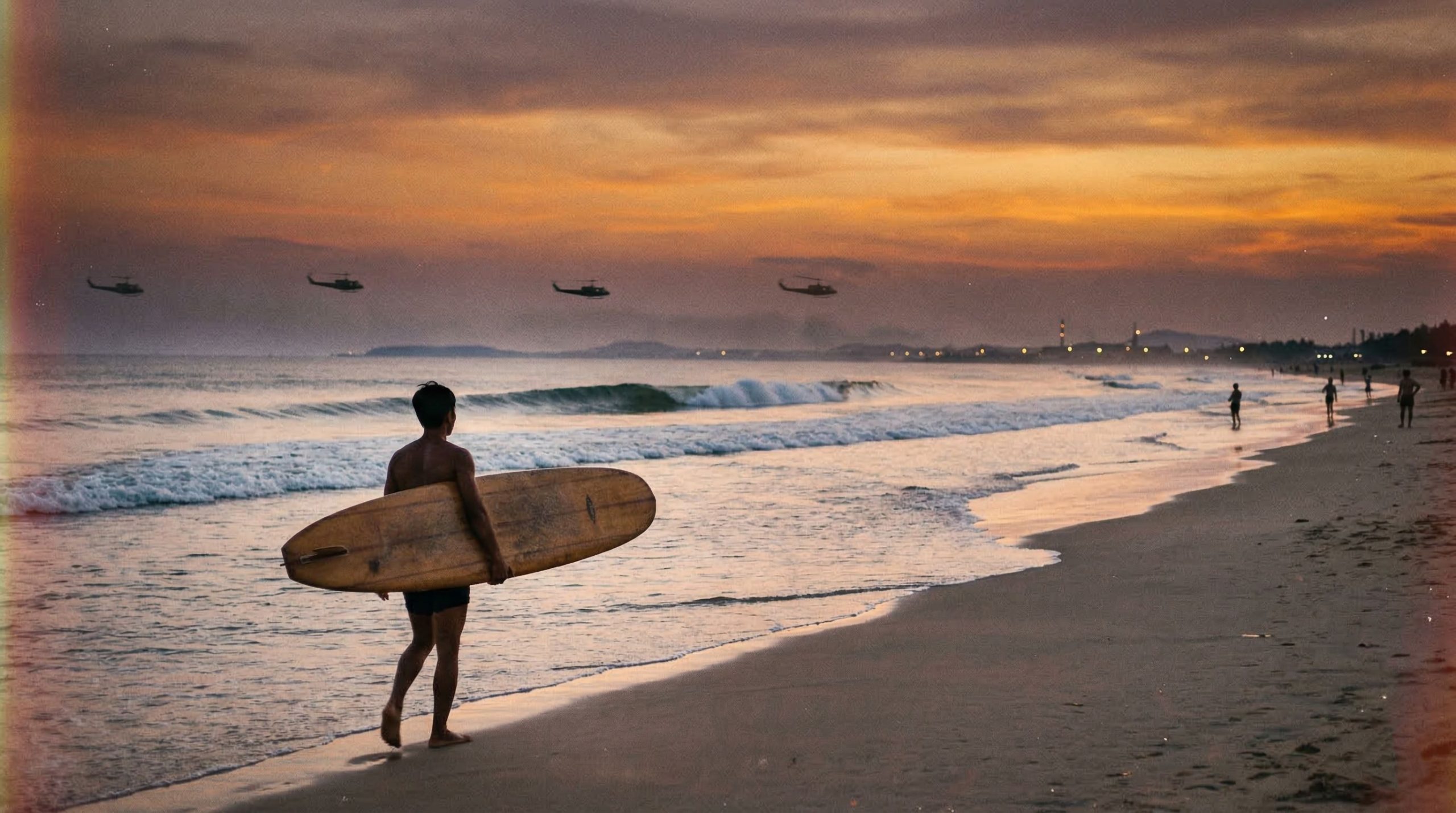 Vintage grain photo of a male surfer (likely an American GI) carrying a longboard on a beach with helicopters in formation in the background